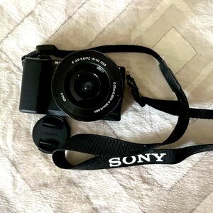 COPY - Sony a5100 16-50mm Mirrorless Digital Camera with 3-Inch Flip Up LCD (Bl…